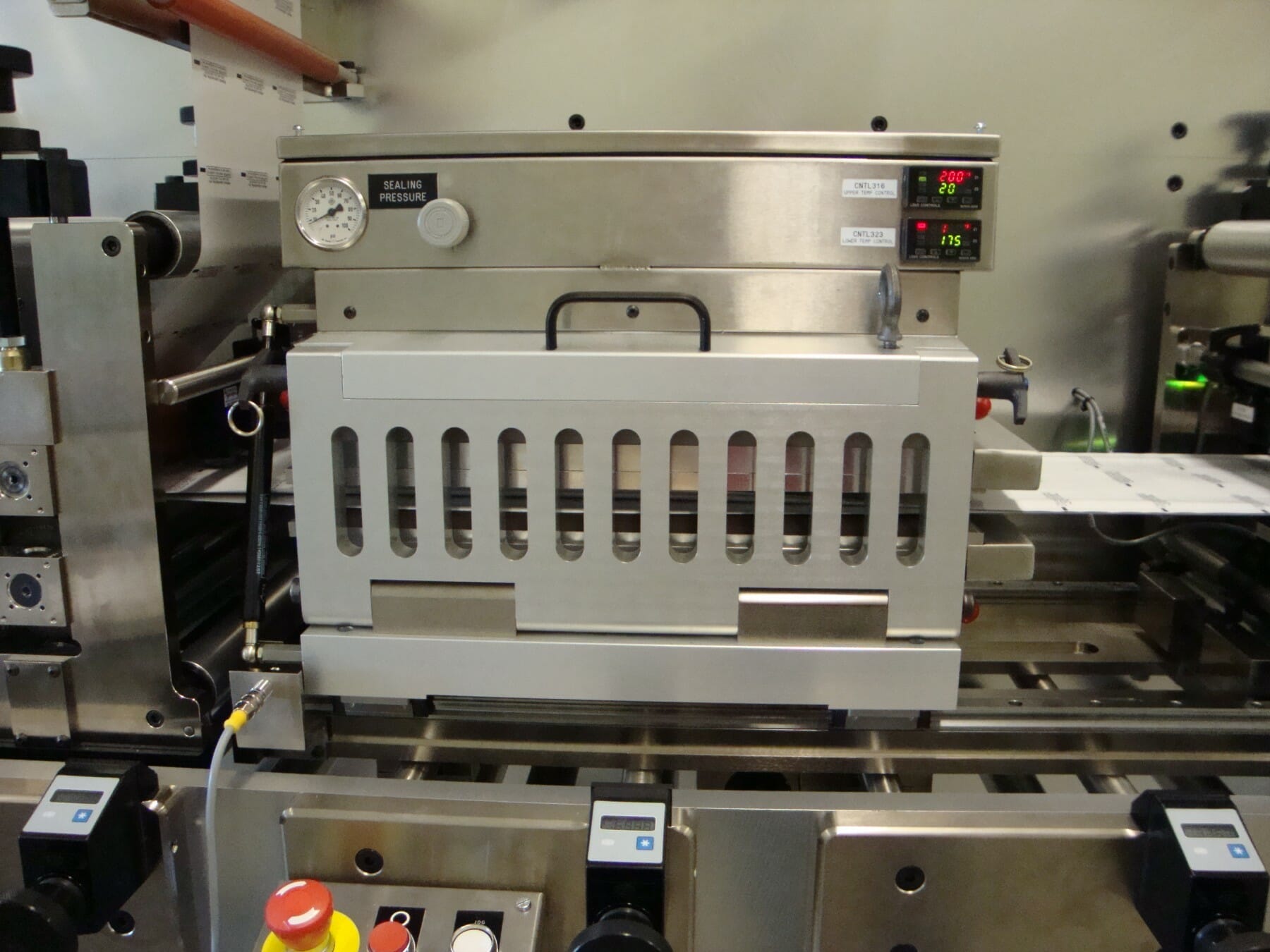 reciprocating heat seal manifold mount packager